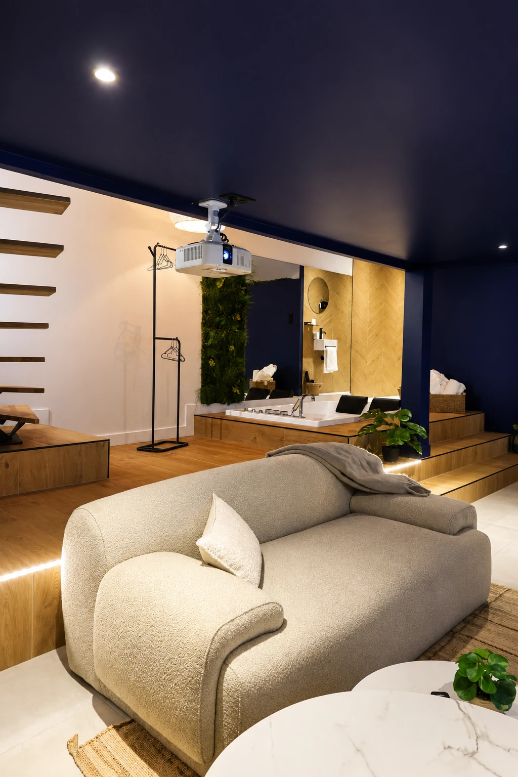 Le salon, son canapé et le volume ouvert du Loft